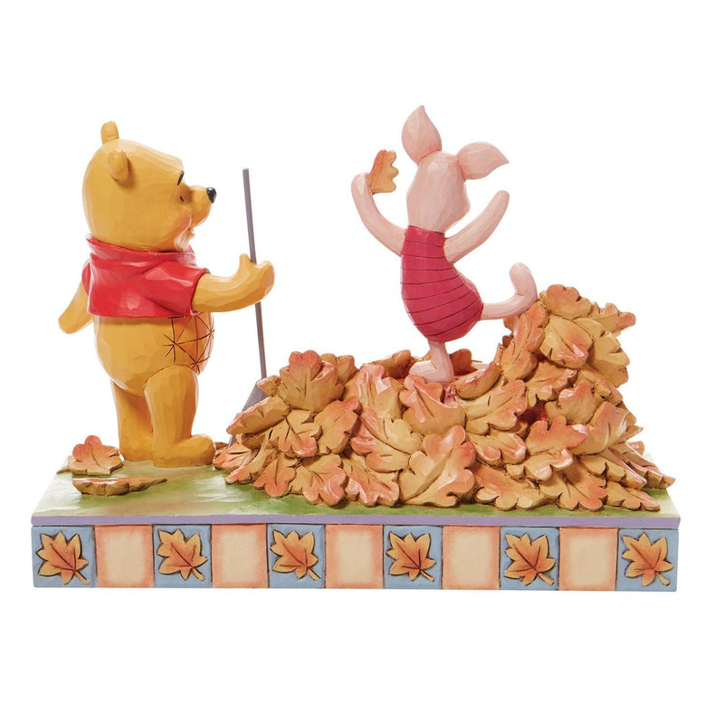 Disney Traditions Winnie The Pooh & Piglet Jumping into Fall Figurine